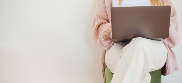 Woman sitting and typing